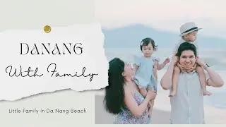 Happy Family of Four at Da Nang Beach Parents with a Little Boy and Girl