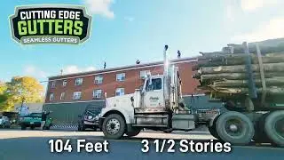 Teamwork in Action: Raising a 104ft Seamless Gutter on a Two-Story Home!