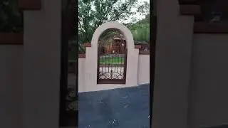 2 wrought iron gates installed in a courtyard - by Affordable Fence and Gates, Tucson AZ