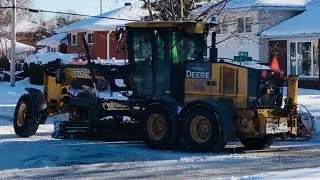Snow Removal John Deere Grader Plowing Streets