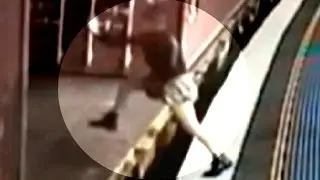 Woman Jumps onto Moving Freight Train