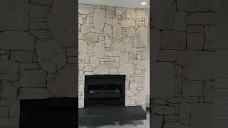 Local stone fireplace all finished off 🔥 #fireplace #stonework #construction #stonearchitecture