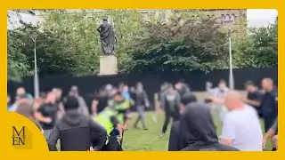Moment fight breaks out at 'Enough is Enough' protest in Manchester