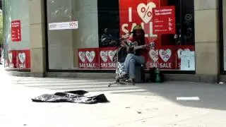 Bob Marley - I Shot The Sheriff (cover by street singer)