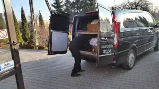 załadunek trumien ze zmarłymi do kremacjii