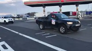 Convoy of donated vehicles and supplies for Ukraine.