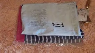 Посылка с магазина Tmart.ru #1. Футболка женская и увлажняющая помада