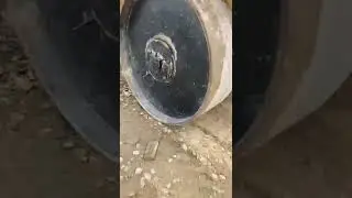 Road roller compaction of soil