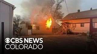 Colorado firefighters save nearby home after space heater sparks garage fire