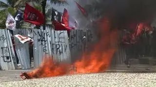 Oil workers, police clash as Brazil auctions oil licenses