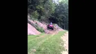 Greg fixing the cabin road.