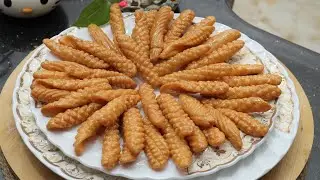 جربيه هتنسي الحلويات كلها بعديه بكوب دقيق ومعلقتين سمن هتعملي أحلي حلا (أصابع)