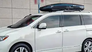 The commercialvehicleNissanQuest is installed withacompletesetof NEUMANN301roofrack and K6 roofbox.