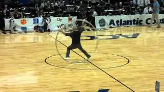 Ring man doing tricks in huge hula hoop ring