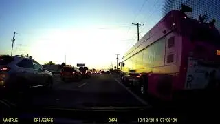 Lynx bus using bike lane to pass.