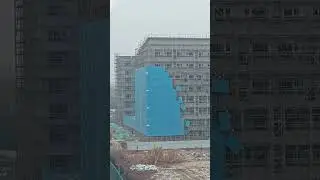 6644: Chinese construction workers dismantle steel mesh in ant like pattern