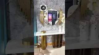 Elevate your home d&eacute;cor with this stunning console table and mirror set from PMD Metals.