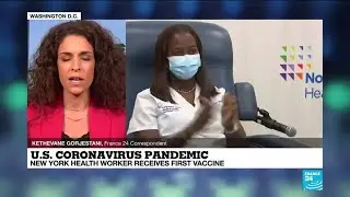 Nurse gets first jab as US begins Covid-19 vaccinations
