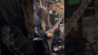 Max Cavalera doing a guitar solo 