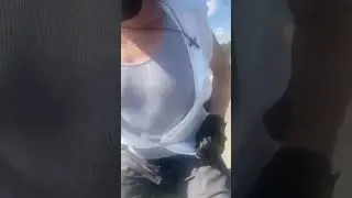 White pilot shirt and gray tank top 