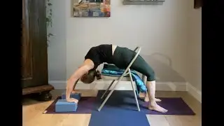 Urdhva Dhanurasana (Upward Bow/Wheel pose) over a yoga chair