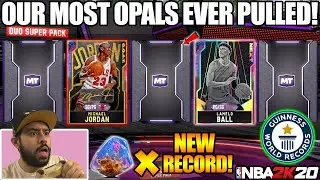 I PULLED A NEW RECORD OF GALAXY OPALS WITH JUICED DYNAMIC DUO PACKS IN NBA 2K20 MYTEAM PACK OPENING