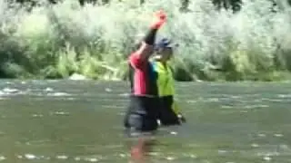 Winching a massive boulder while gold dredging
