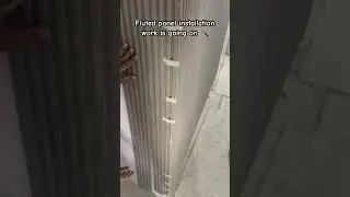 Fluted panel installation work is going on #flutedpanel #shorts #shortvideo #interiordesign #viral
