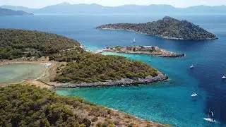 Drone footage of Agistri island in Greece: Skala village and the Aponissos beach