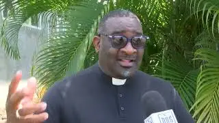 FATHER SMITH CALLS ON CATHOLICS TO TURN FAITH INTO SOCIAL ACTION