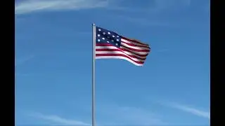 USS Alliance Ensign Flag Flying in the Wind