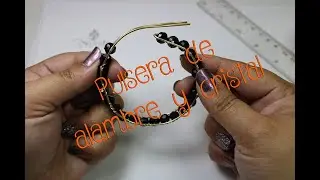Cómo hacer una pulsera de con alambre y cristal... Aprende a hacer una bella pulsera con alambre.