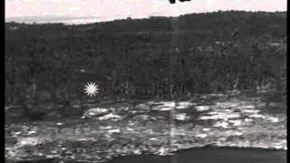 Aerial views of US landing craft underway and on beach in Angaur Island, Palau du...HD Stock Footage