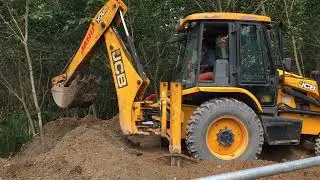 Jcb 3dx filling soil inside foundation made for construction 