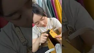 Finishing a yellow ostrich handbag #customized #womenbag #highendbag #leatherwork#UAE