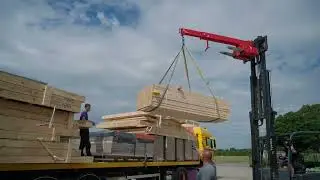 Effici&euml;nte werflogistiek met prefab hout | Laadzone op de werf bij Tronco
