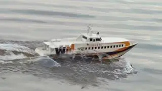 Playing Rc Boat On The Beach