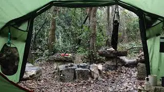 Relaxing rain drops on a tent in the forest 