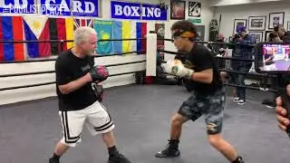 Blair Cobbs hits the speed mitts with Freddie Roach at the media day for his bout with Alexis Rocha