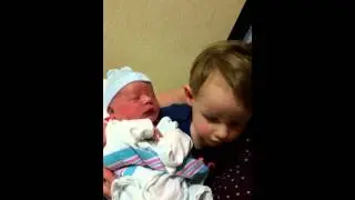 Olivia Rose meets baby Christopher James