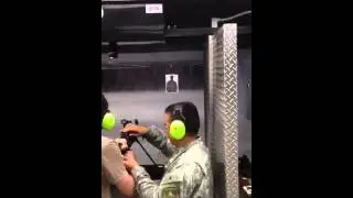 Mark Falvey firing a Machine Gun