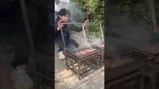 This mechanical BBQ motion is addictive.#Barbecuegrill #Carbonoven #bbq #outdoorcooking #BlazeFor
