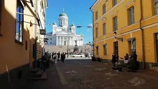 Street music on Sofiankatu in Helsinki with the view on Senate Square