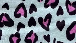 Tela de algod&oacute;n con lycra cardado estampada verde agua animal print rosa
