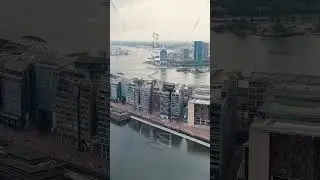 Vertical video. Amsterdam, Netherlands. Nieuwmarkt en Lastage area. Bay IJ (Amsterdam), Aerial Vi...