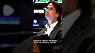 Stock futures inch down as Wal...