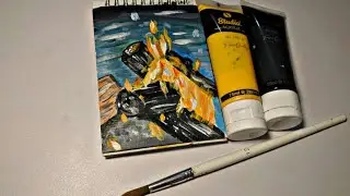 Painting bonfire scene on small sketchbook