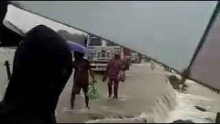 Flood over at National Highway No.31 at Beltoli,Bilasipara
