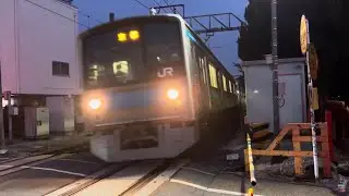 JR 205 Series Keihin Tohoku Line departing Inari Station in Kyoto, Japan