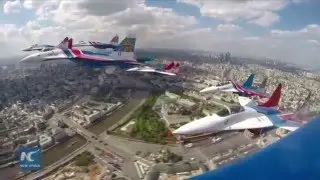 RAW: Su-35 jets used in Syria campaign take part in Red Square flypast